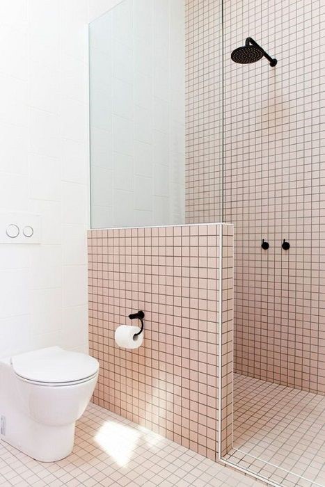 pink bathroom with black accents