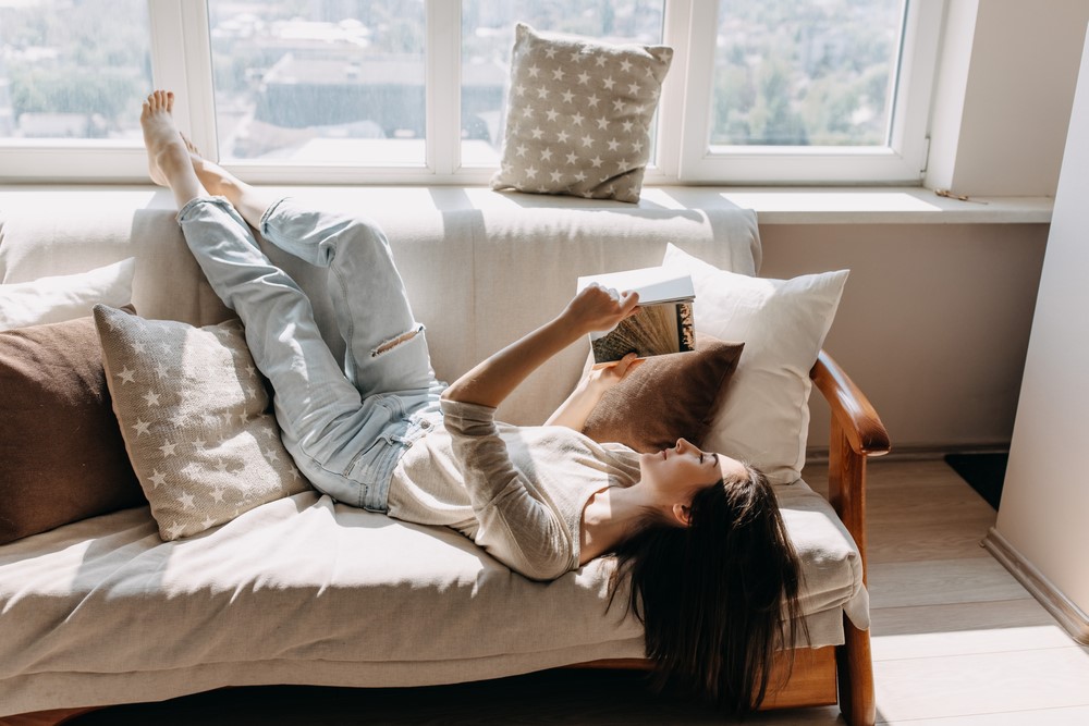 woman relaxing on sofa